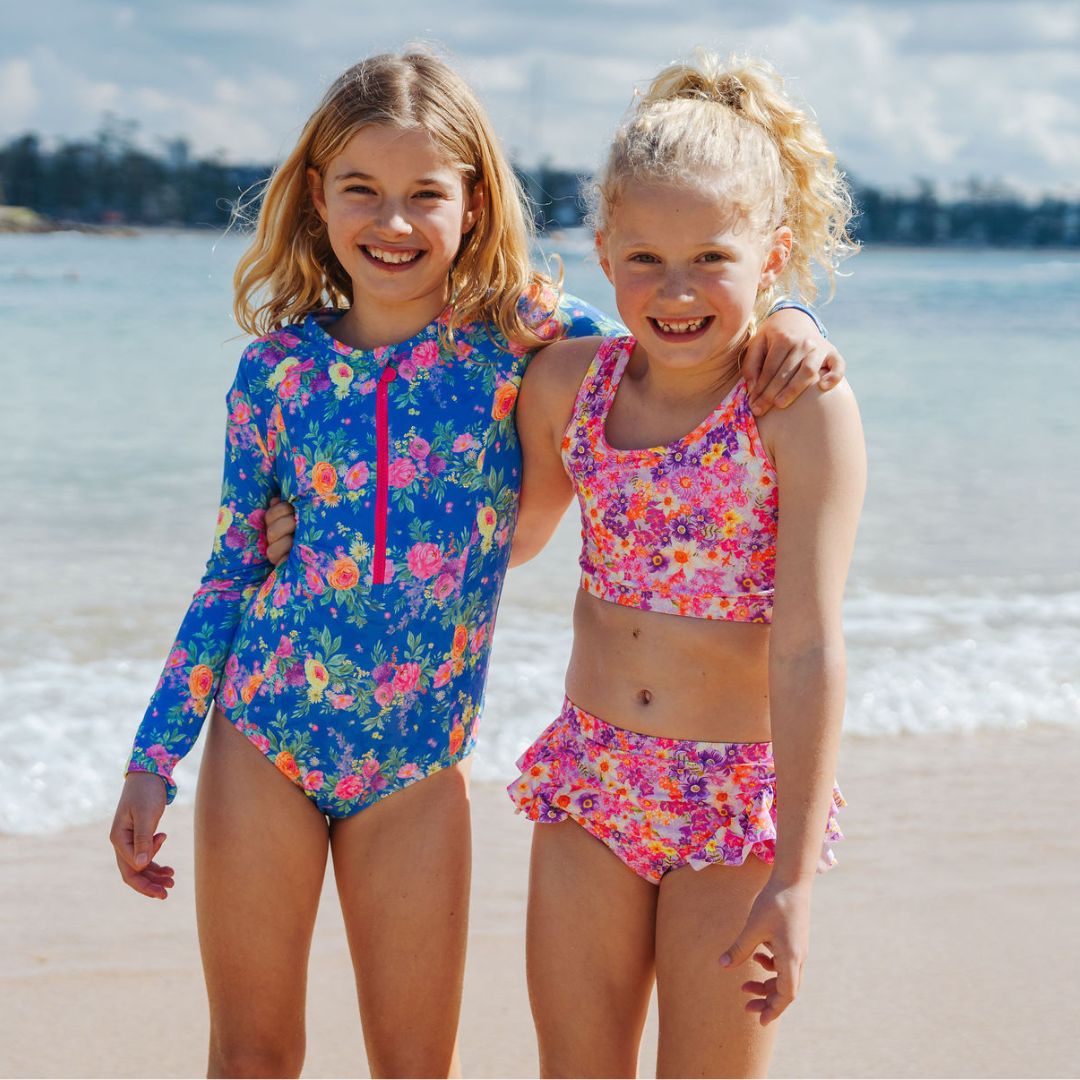 girls at beach wearing ocean tales swimwear