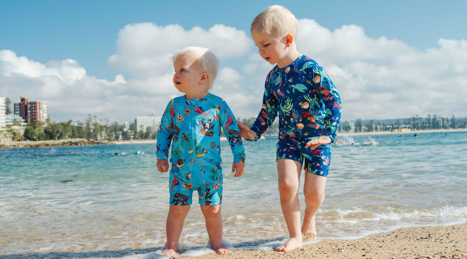 brothers wearing ocean tales swimwear